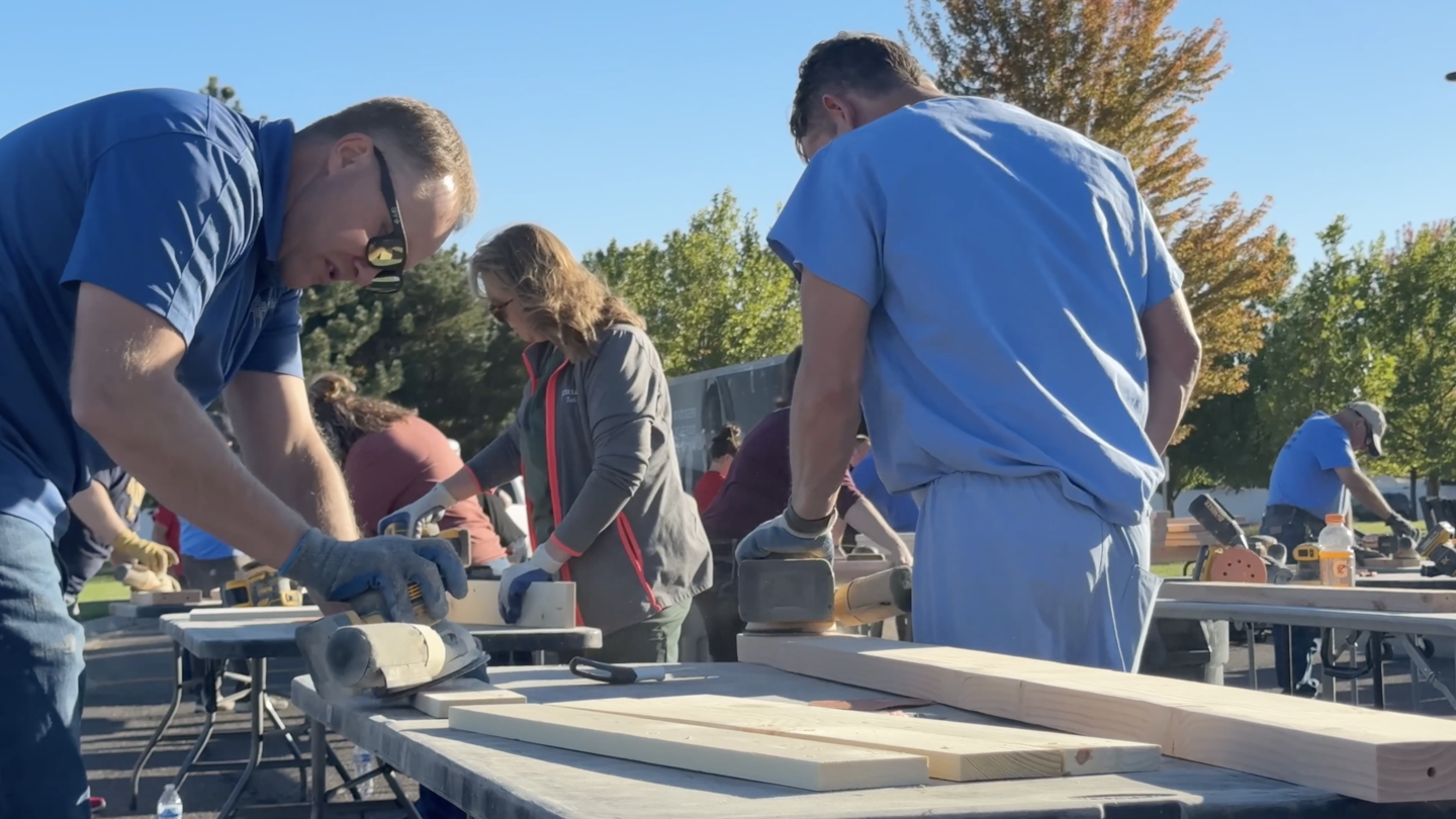Staff hard at work building new beds.